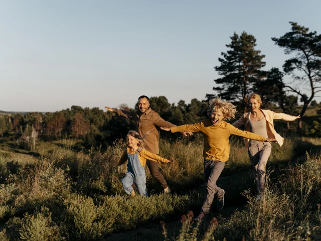 Full Shot Family Running Meadow